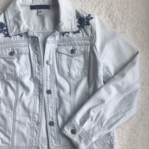 Stylish ripped and embroidered jean jacket